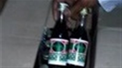 ضبط 600 زجاجة خمور مجهولة المصدر بنجع حمادى