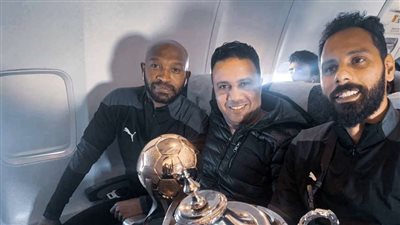 بسبب كورونا.. بعثة الزمالك ترتدي كمامات في مطار القاهرة 