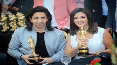 دنيا سمير غانم وهشام جمال يشاركان في فريق مكافحة 