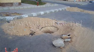 «حفرة» خطيرة تهدد حياة سكان 800 فدان بأكتوبر الجديدة (صور) 