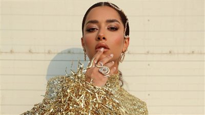 بلقيس بإطلالة مذهلة في حفل ختام كأس العالم بقطر (صور)