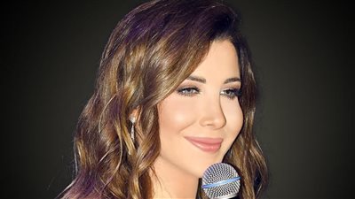 نانسي عجرم تفاجئ جمهورها بموقف إنساني خلال حفلها بالكويت