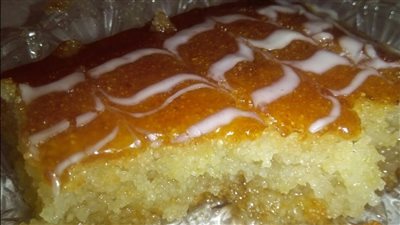 بالفيديو.. طريقة عمل البسبوسة بشراب البرتقال