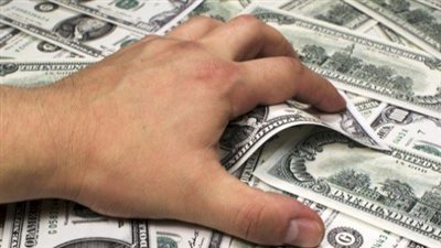 تفاصيل القبض على المتهمين بسرقة مبالغ مالية من شقة بالعجوزة