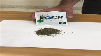 القبض علي تاجر مخدرات بمدينة بدر وبحوزته 400 كيس باودر