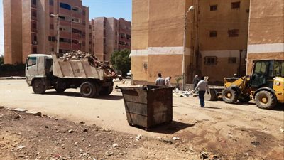 إزالة الإشغالات والتعديات وتنفيذ أعمال النظافة العامة بمدن أسوان وكوم أمبو
