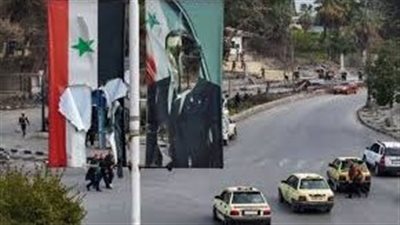  إزالة العلم السوري الموجود فوق مبنى السفارة في موسكو