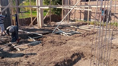 إزالة حالتي تعد علي أراضي أملاك الدولة غرب الأقصر (صور)