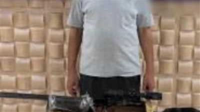  الداخلية تكشف حقيقة صورة شاب يحمل بندقية بتليسكوب في كفر الشيخ