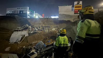 هبوط أرضي داخل محطة وقود وراء اختفاء محلات وإصابة شخصان بالتجمع