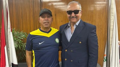 أشرف نصار رئيس نادي البنك الأهلي مع بدر رجب 
