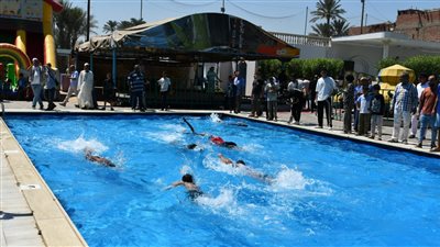وزير الرياضة ومحافظ الفيوم يفتتحان حمام سباحة بمركز شباب الشهيد ربيع محمد كاسب